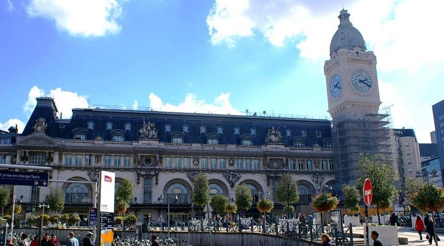 Historic Gare de Lyon in Paris with its iconic clock tower and elegant architecture.